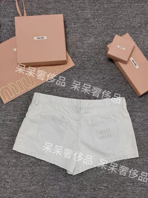 miumiu шорты, джинсы. - Изображение 1 из 4