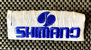 SHIMANO BORDADO COSER EN RECORTAR PARCHE APAREJOS DE PESCA CICLISMO 5 1/4" X 2" - Imagen 1 de 2