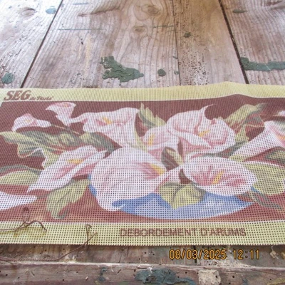 canevas neuf  présente des arums - Photo 1/2