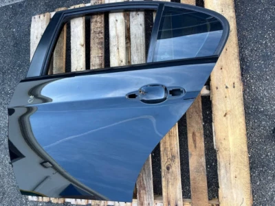 BMW 328i Xdrive 2007-2011 sedán puerta trasera izquierda panel carcasa negro OEM Foto 1 de 4