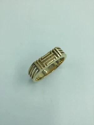 Brazalete con bisagras de metal de latón brillante Tory Burch usado en excelente estado para mujer Foto 1 de 3