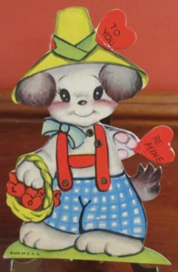Tarjeta de San Valentín mecánica vintage de EE. UU. PERRO CACHORRO ANTROPOMÓRFICO con CESTA SOMBRERO - Imagen 1 de 6