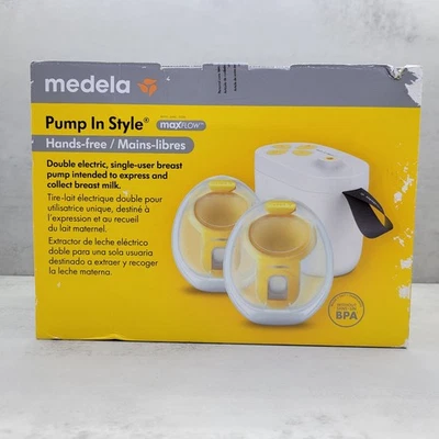 Extractor de leche eléctrico doble estilo Medela con colección portátil en sujetador Foto 1 de 4