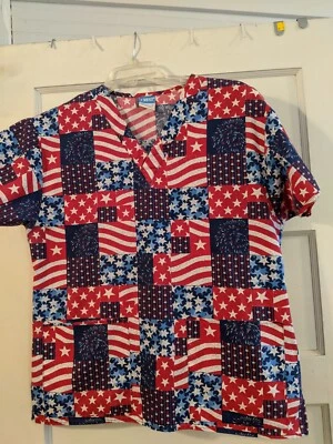 Womens Patriotic Scrub Top. Red/White/Blue Stars, Fireworks, Flag. Size Medium. - Image 1 of 4