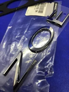 Logo Badge Renault ZOE Emblème Original 908929219R Neuf - Imagen 1 de 13