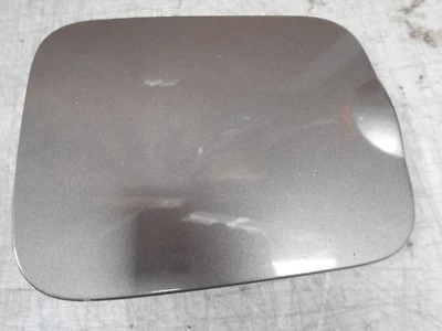 2001 Nissan Quest Van  Fuel door gas door color looks silver - Image 1 of 3