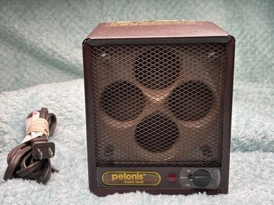 Horno de disco portátil calentador de espacio de cerámica Pelonis Honeycomb - Funciona muy bien Foto 1 de 4