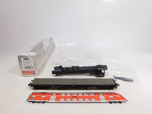 EC942-0,5 # Piko H0 Dc 54803 Flat Wagon Rgs Dr Nem Kk Kkk Mit Loktorso Mint +Box - Picture 1 of 5