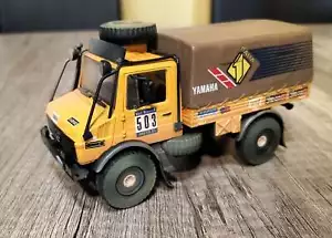 NOREV MERCEDES UNIMOG 4x4 CAMION RALLY PARIGI-DAKAR 1984 - 1/43 - Foto 1 di 3