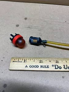 A pre-owned Primer Bulb & Filter from a Toro Model 51930 Grass trimmer powerhead - Picture 1 of 2