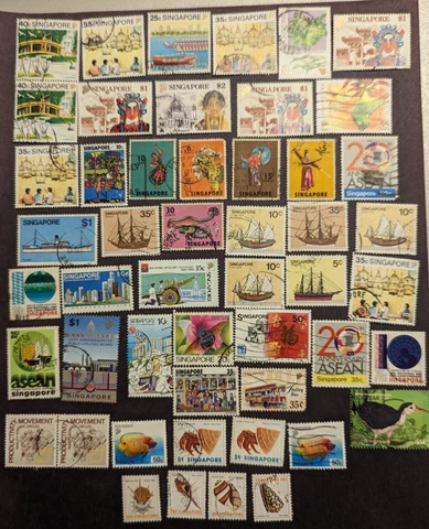A lot of 50 Singapore Stamps, Various Vintage & Denominations Cover
