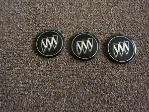 Three Black and Silver Buick Clear Plastic Center Wheel Emblems - Picture 1 of 6