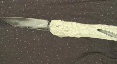 Kershaw 9000 WHS Magnacut Diskin Livewire Reverse Tanto 白色雕刻设计 — 第 1/4 张图片