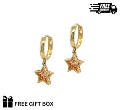 Pendientes Huggie de aro con estrella colgantes de oro amarillo y rosa de 14k Foto 1 de 3