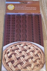 Molde de impresión de corteza de pastel de silicona WILTON para bordes de perlas de cuerda trenza clásica - Imagen 1 de 3