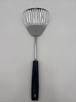 Cuchara ranurada Ekco Kitchamajig de colección copas látigos utensilio mango negro Foto 1 de 4