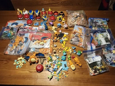 Enorme lote de juegos incompletos Pokemon Mega Construx algunos completos y algunos incompletos  Foto 1 de 4