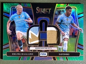 Muestras dobles Panini Select FIFA Erling Haaland Savinho 2024-25 verde Prizm/5 - Imagen 1 de 2
