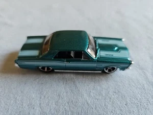 Pontiac GTO 2012 Hot Wheels Mystery Models '65 verde aguamarina 1/24 suelto - Imagen 1 de 7