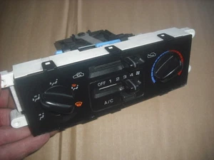 A GENUINE SUBARU FORESTER A/C HEATER CONTROL PANEL / SWITCHES / DIALS - Picture 1 of 1