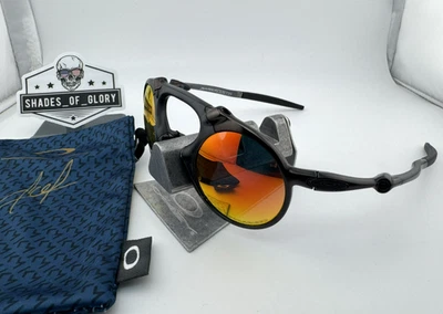 GAFAS DE SOL POLARIZADAS OAKLEY MADMAN CARBONO OSCURO CON IRIDIO RUBÍ OO6019-04 RARAS Foto 1 de 4