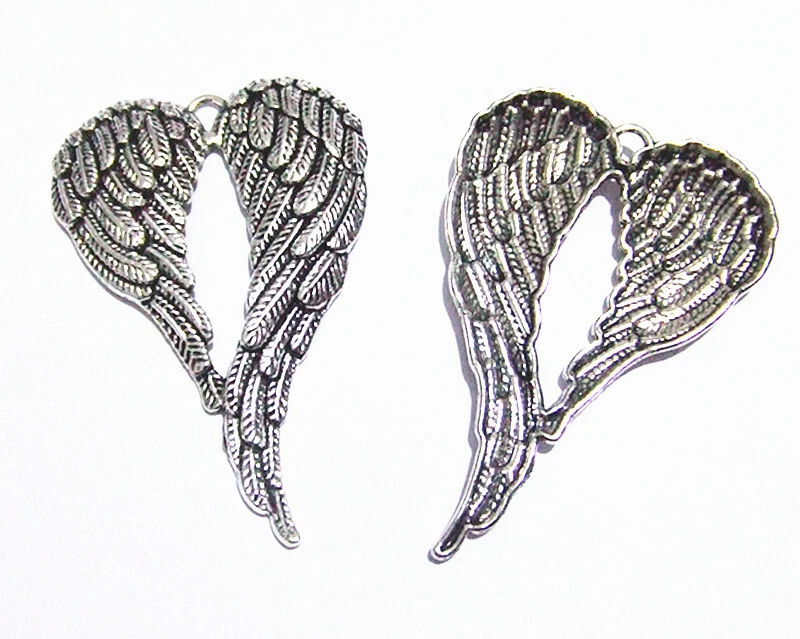 2pz ciondoli ali d'angelo  in metallo 69x47mm colore argento tibetano bijoux - Immagine 1 di 1