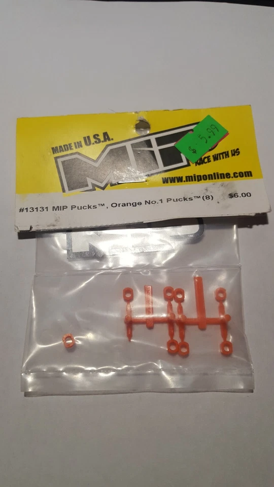 MIP PUCKS, ORANGE No.1 PUCKS (8) #13131 - Image 1 of 1