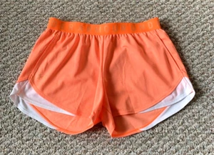 Under Armour Damen NEU 1349125-866 meliert orange weiß lockere Passform Shorts Größe M - Bild 1 von 11