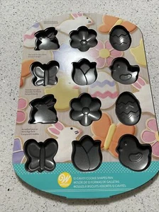 WILTON 12-Cavity Cookie Shapes Pan Easter & Spring Cookies (210500611) New - Picture 1 of 6