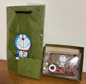 GUCCI × Doraemon Mini Geldbörse braun/rot - unbenutzt, Box & Zertifikat dabei - Bild 1 von 4