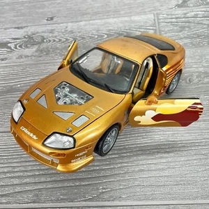 2 Fast 2 Furious Jacks Toyota Supra Gold Die Cast 1/18 Model Car 2002 - FLAWS - Picture 1 of 12