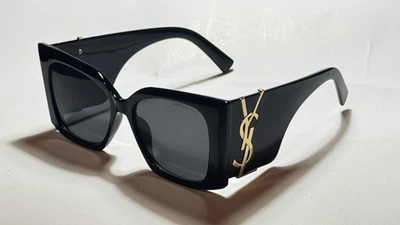 Gafas de sol negras con detalles de color dorado de gran tamaño moda gafas de sol mujeres hombres Foto 1 de 4