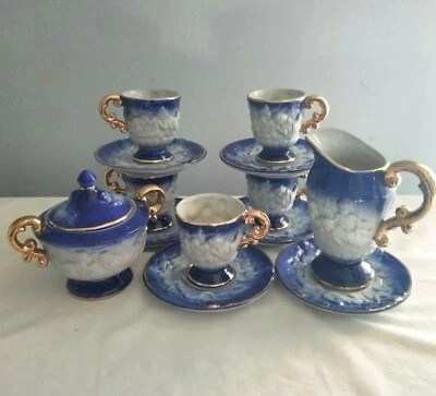 Vintage Raised Cherub Cups Saucers Sugar Creamer Blue White Gold Trim Set of 13 - Image 1 of 4