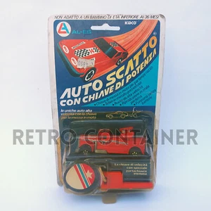 VINTAGE 1980 AUTO SCATTO CON CHIAVE BURNIN' KEY CAR 1:66 MISB MOC NEW - Picture 1 of 1
