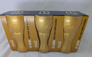 3x Mc Donalds Coca Cola Gläser Gold  2025 NEU Limited Edition 20 Jahre - Bild 1 von 2