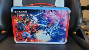 FUNKO TRANSFORMERS VS G.I. JOE METAL LONCHERA GAMESTOP EXCLUSIVA ESTAÑO NUEVO VACÍO - Imagen 1 de 5