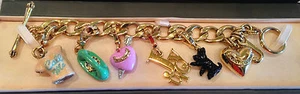 JUICY COUTURE CHARM BRACELET WITH RETIRED CHARMS - Picture 1 of 6