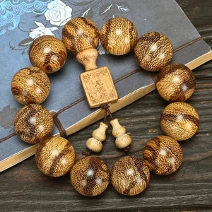 Bracciale perle preghiera amuleto Buddha modello pelle di tigre legno naturale 20 mm * 12 regalo - Foto 1 di 7