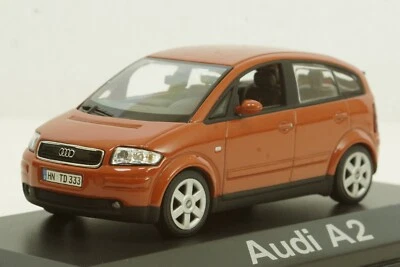 Audi A2 1999, оранжевый 2.00.222.00748.002, Minichamps 1:43 - Изображение 1 из 4