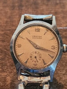 OROLOGIO VINTAGE CROTON BUCCANEER CARICA MANUALE A CONCHIGLIA - Foto 1 di 6