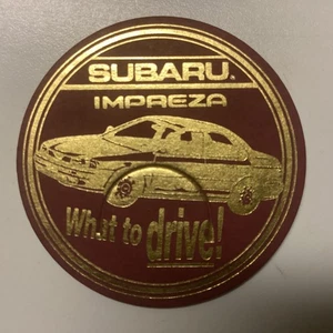 Vintage Subaru Impreza What to Drive Hawaii POG Milk Cap 1993 Car Advertising - Picture 1 of 2