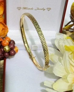 Brazalete Ovalado Italiano Oro Amarillo 18k Brillante Cerradura Abierta. 8,98 gramos. Talla 60 mm - Imagen 1 de 11