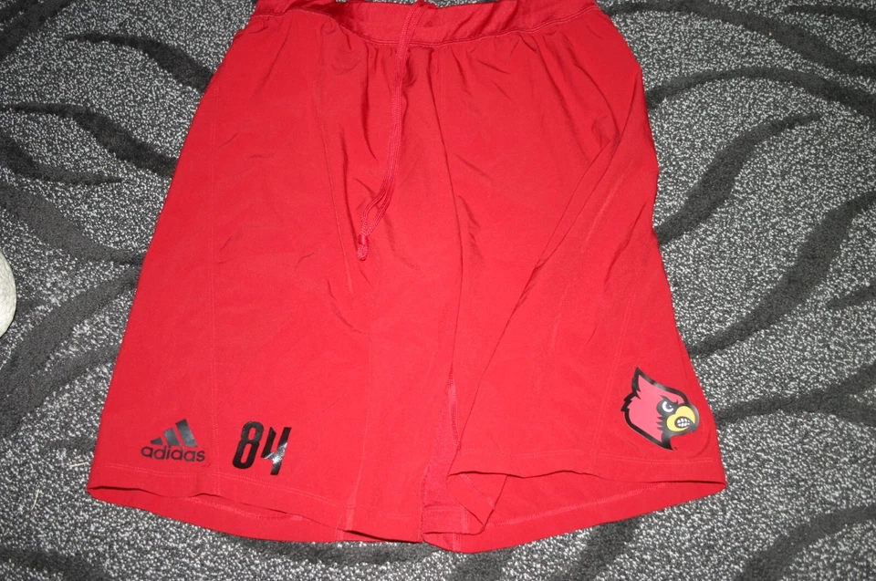 Louisville Cardinals Football team issued red Adidas shorts L #84 - Image 1 of 1