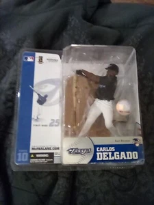 Camiseta deportiva azul de Carlos Delgado - variante Chase - MLB Blue Jays - McFarlane serie 10 - Imagen 1 de 6