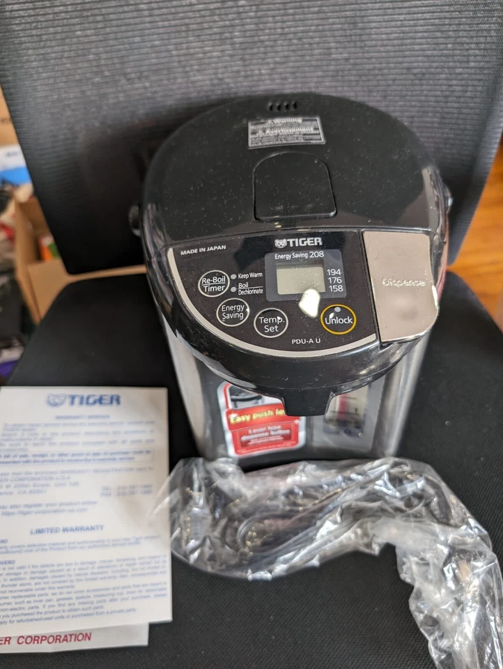 Caldera y calentador de agua caliente eléctrico Tiger PDU-A30U de 3 litros (negro inoxidable) Foto 1 de 4