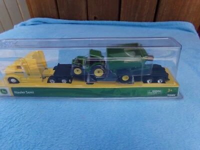 John Deere Tomy Hauler Yellow Semi Tractor With Cart 2018 yr NIB - Image 1 of 4
