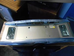 NEW NISSAN LICENSE LAMP TRIM PANEL OEM 908197S606 - Picture 1 of 5