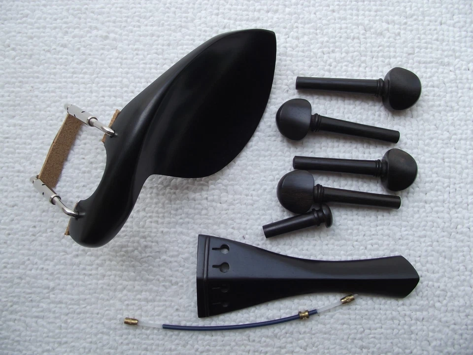Ebony 4/4 violin parts(pegs,chin rest,tail piece.) - Image 1 of 1