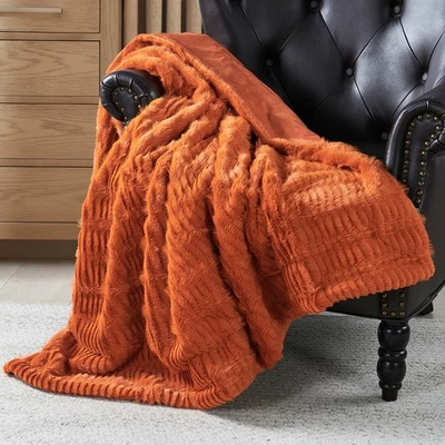 Manta peluda ondulada de felpa de piel sintética con espalda de microminón lujosa tiro difuso Foto 1 de 4