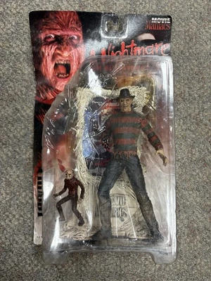 + Figura McFarlane 1998 Movie Maniacs Pesadilla en Elm Street Freddy Krueger Nuevo en Paquete Foto 1 de 4